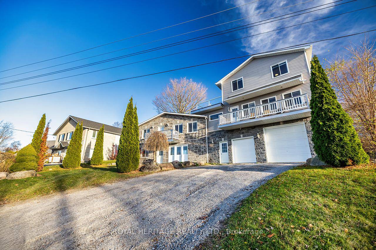 Welcome to this stunning two story, three bedroom home boasting breathtaking, unobstructed western views of Lake Scugog.