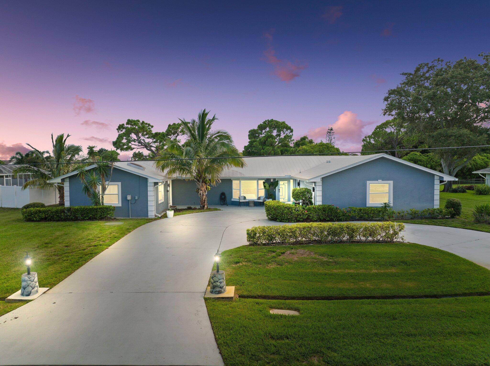 Discover the essence of Florida living nestled on a generous 0.