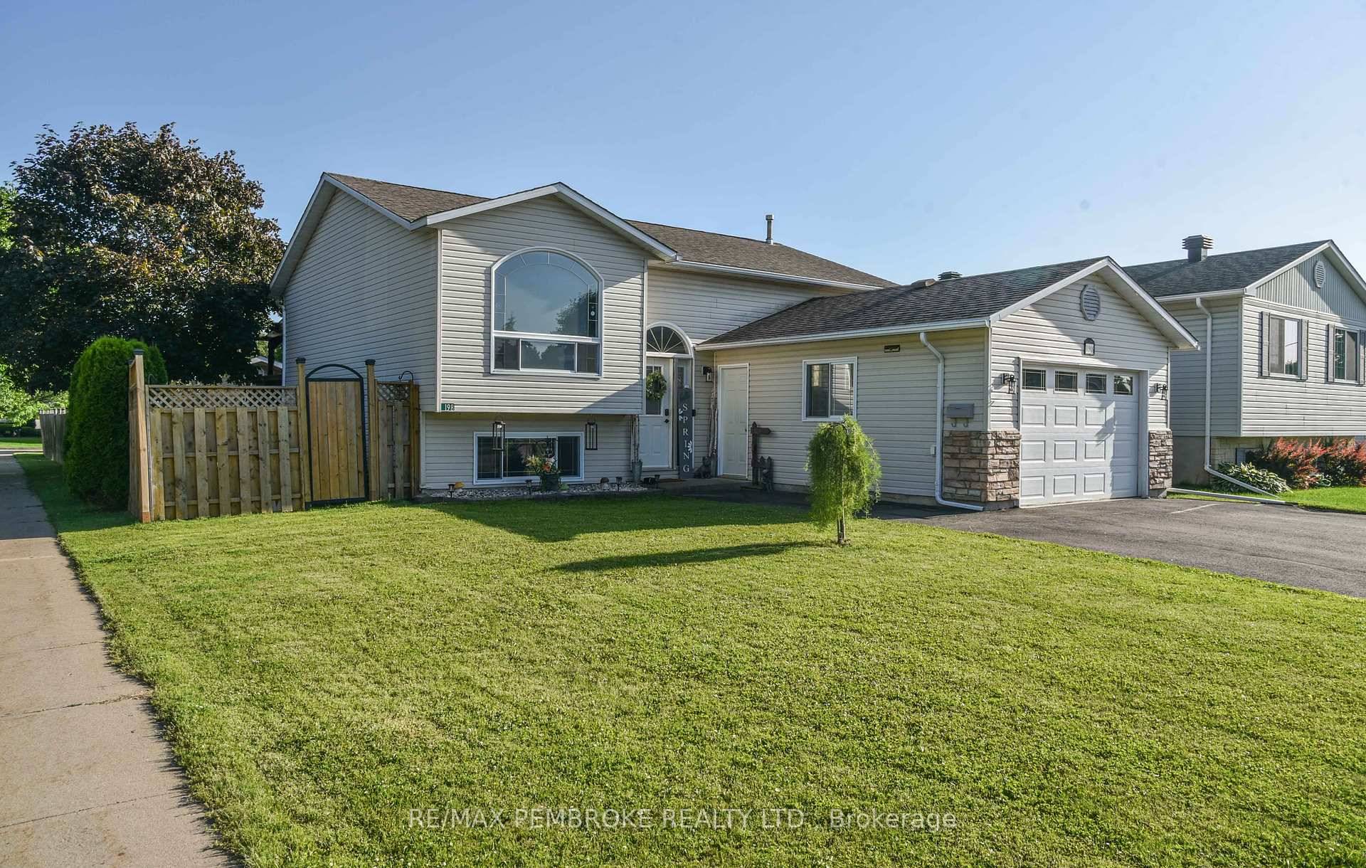 Pride of Ownership Shines Throughout This Beautiful Home in the Heart of Pembroke !