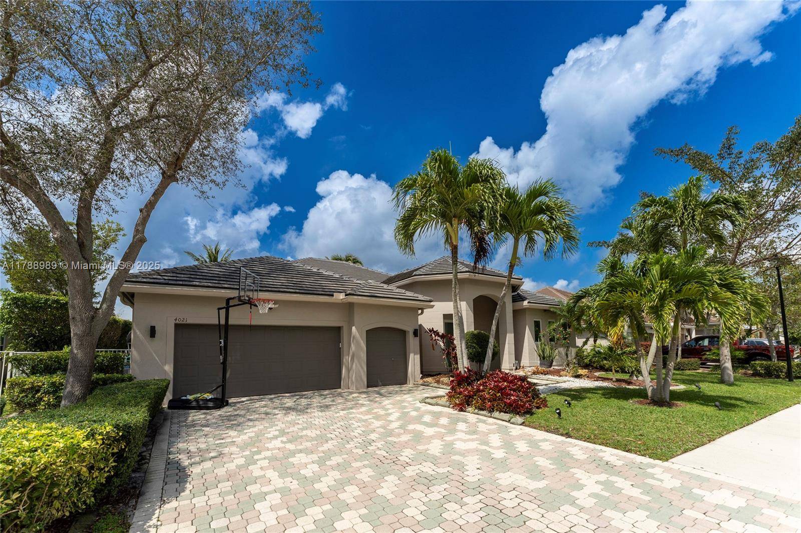 Remodeled single family home with Brand new ROOF in the heart of University Drive in Davie, FL.