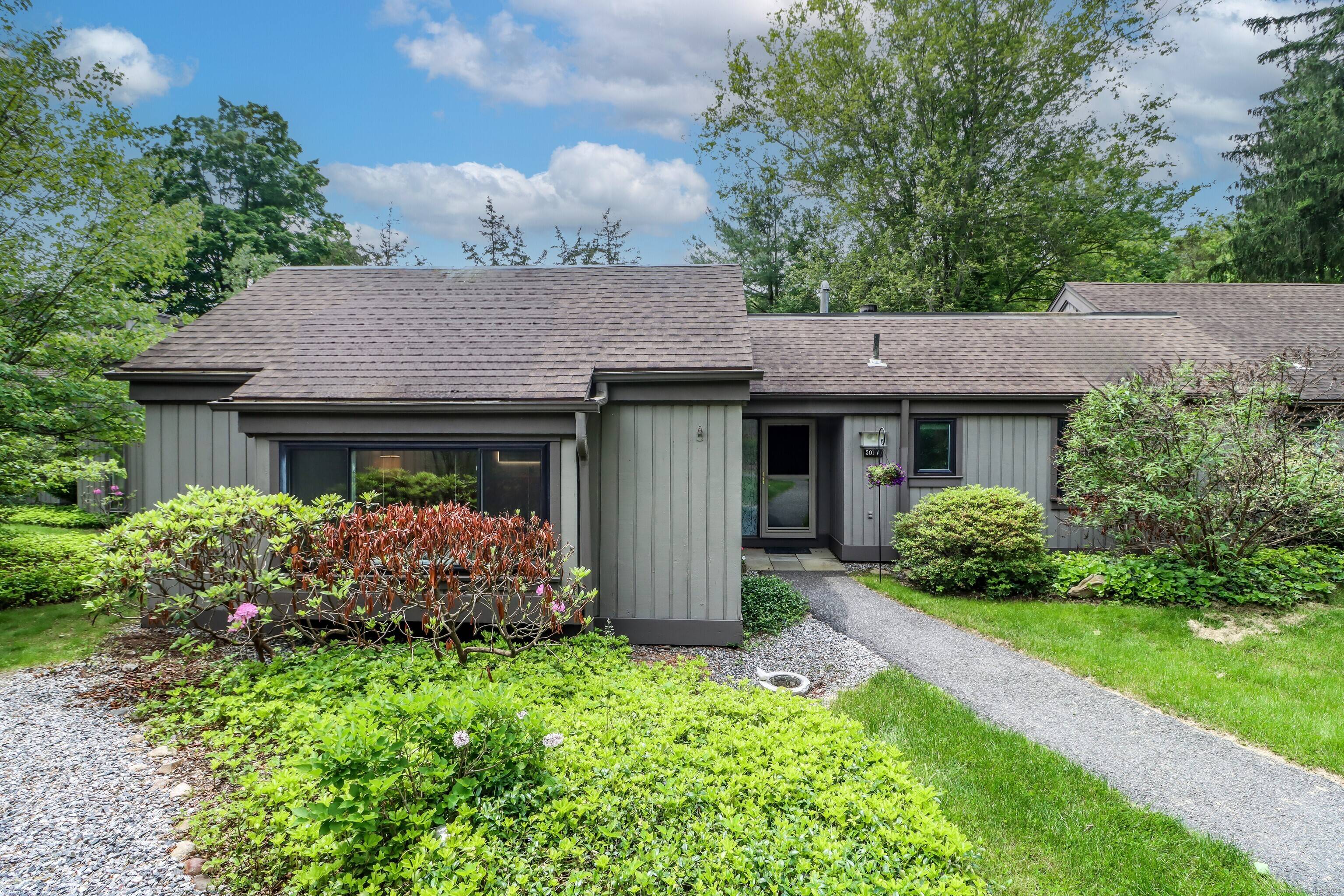 Beautifully updated end unit 3 bedroom Berkshire style condo offering one level living in the highly desirable 55 community of Heritage Village.