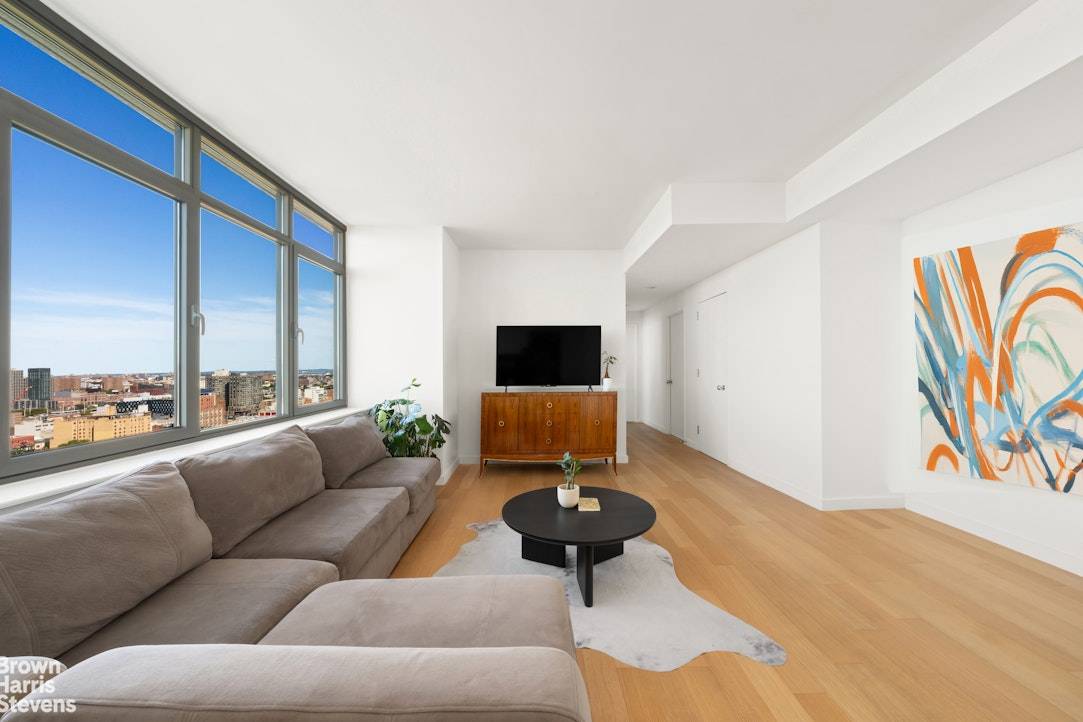Welcome home to Apartment 23A, a spacious 2 bed 2 bath residence in 5th on the Park, one of Harlem's premier full service condominiums !