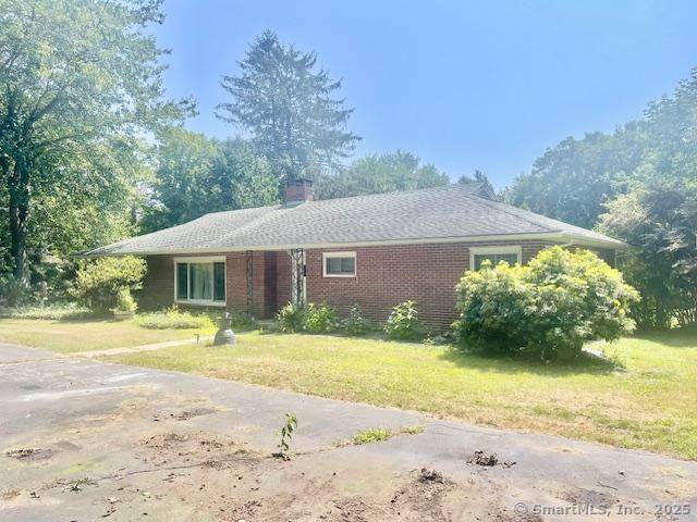WELCOME TO THIS CHARMING BRICK RANCH 0N 9 ACRES, FEATURES LIVING WITH FP.