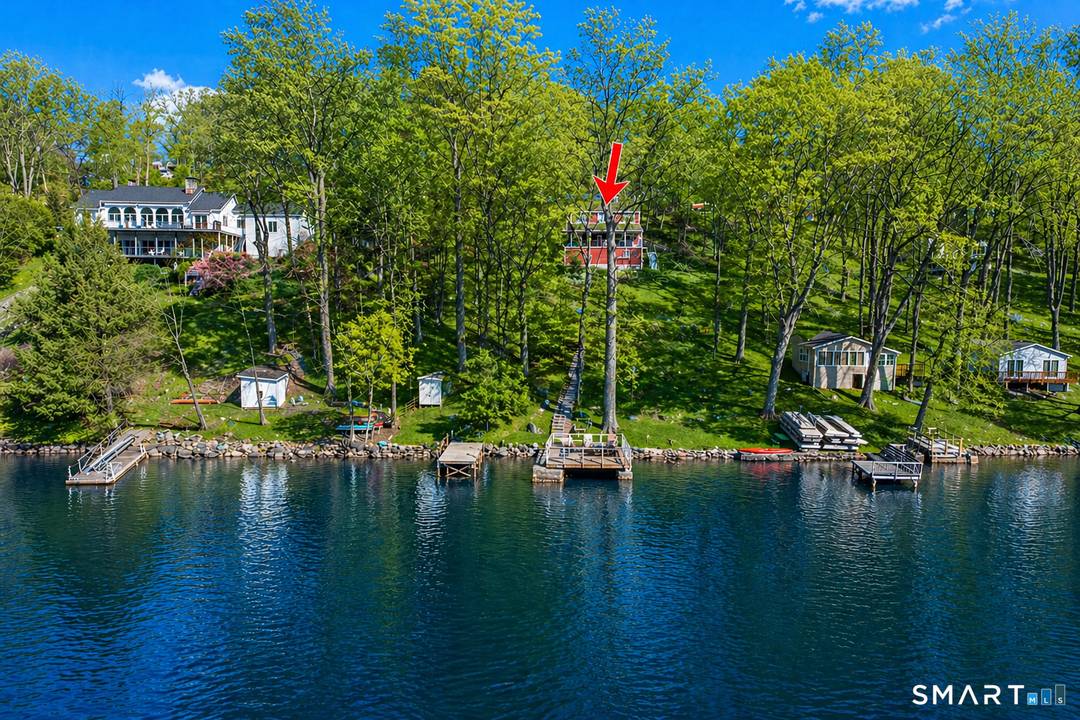 Direct waterfront on Candlewood Lake, conveniently located in the Hemlock Shores community in Danbury.