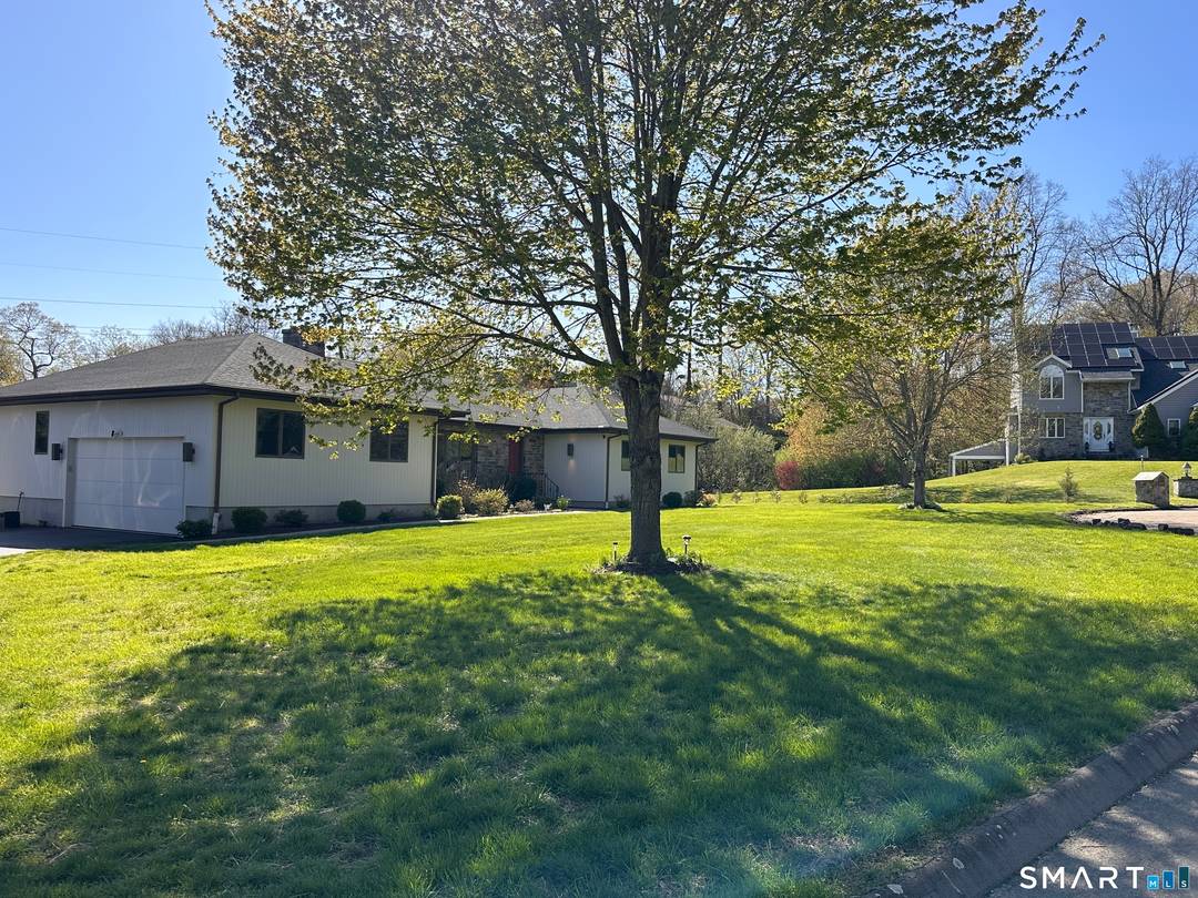 This refreshed custom ranch at 36 Marks Court offers easy one floor living with fantastic versatility.