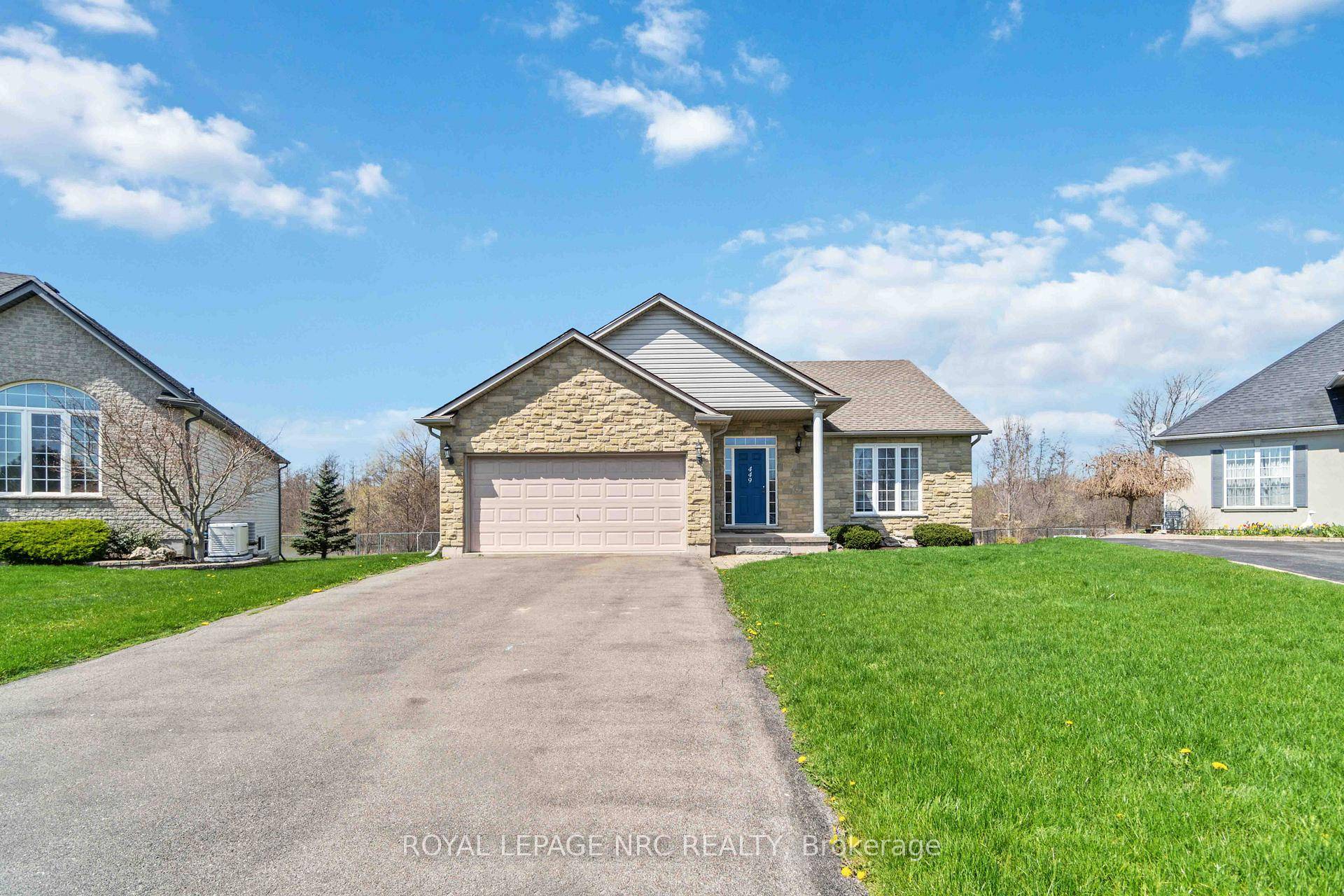 STOP BY AND VISIT THIS 2 2 BEDROOM BUNGALOW WITH ATTACHED GARAGE LOCATED ON A CUL DE SAC AND BACKING ONTO POND WITH PROTECTED LAND.