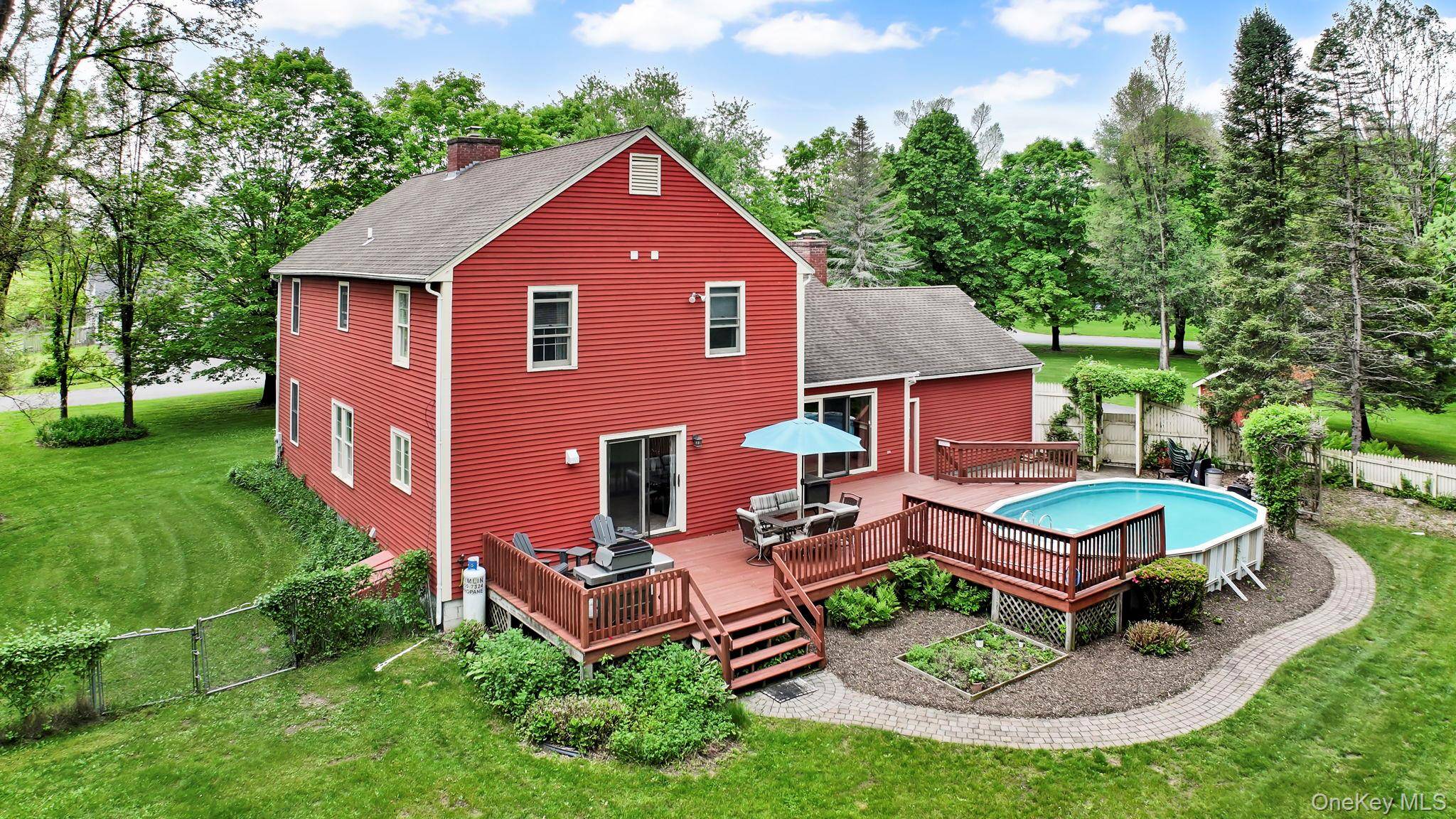 Nestled on a spacious corner lot within a charming subdivision, this meticulously cared for Colonial home is just minutes from the Historic Hamlet of Stone Ridge.