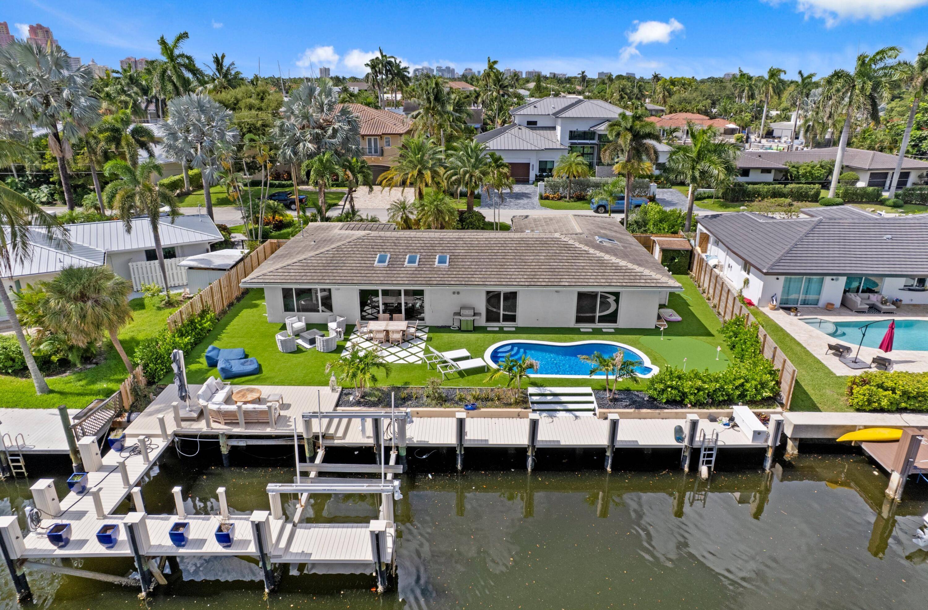 ABSOLUTELY GORGEOUS WATERFRONT ESTATE BOATERS PARADISE BREATHTAKING CANAL VIEWS PRIME FORT LAUDERDALE LOCATION EXQUISITE HIGH END QUALITY WORKMENSHIP NO FIXED BRIDGES DEEP WATER 92 Ft WATERFRONTAGE BOAT LIFT PRIVATE WRAP ...