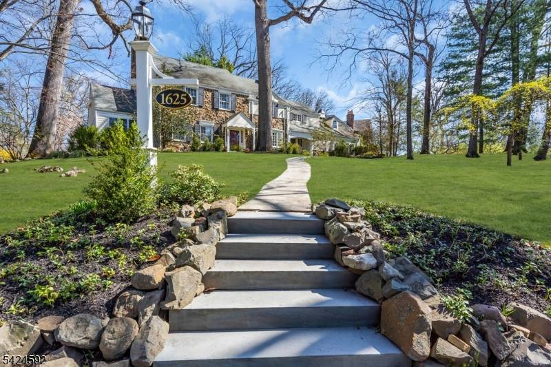 This Williamsburg style center hall Colonial in the heart of Sleepy Hollow offers a seamless blend of classic charm and modern comfort.