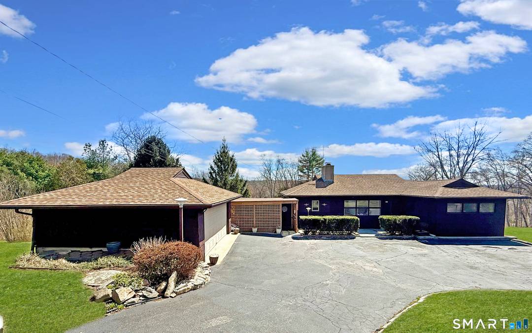 Great possibilities await in this solidly built ranch offering a versatile layout and wonderful indoor outdoor flow.