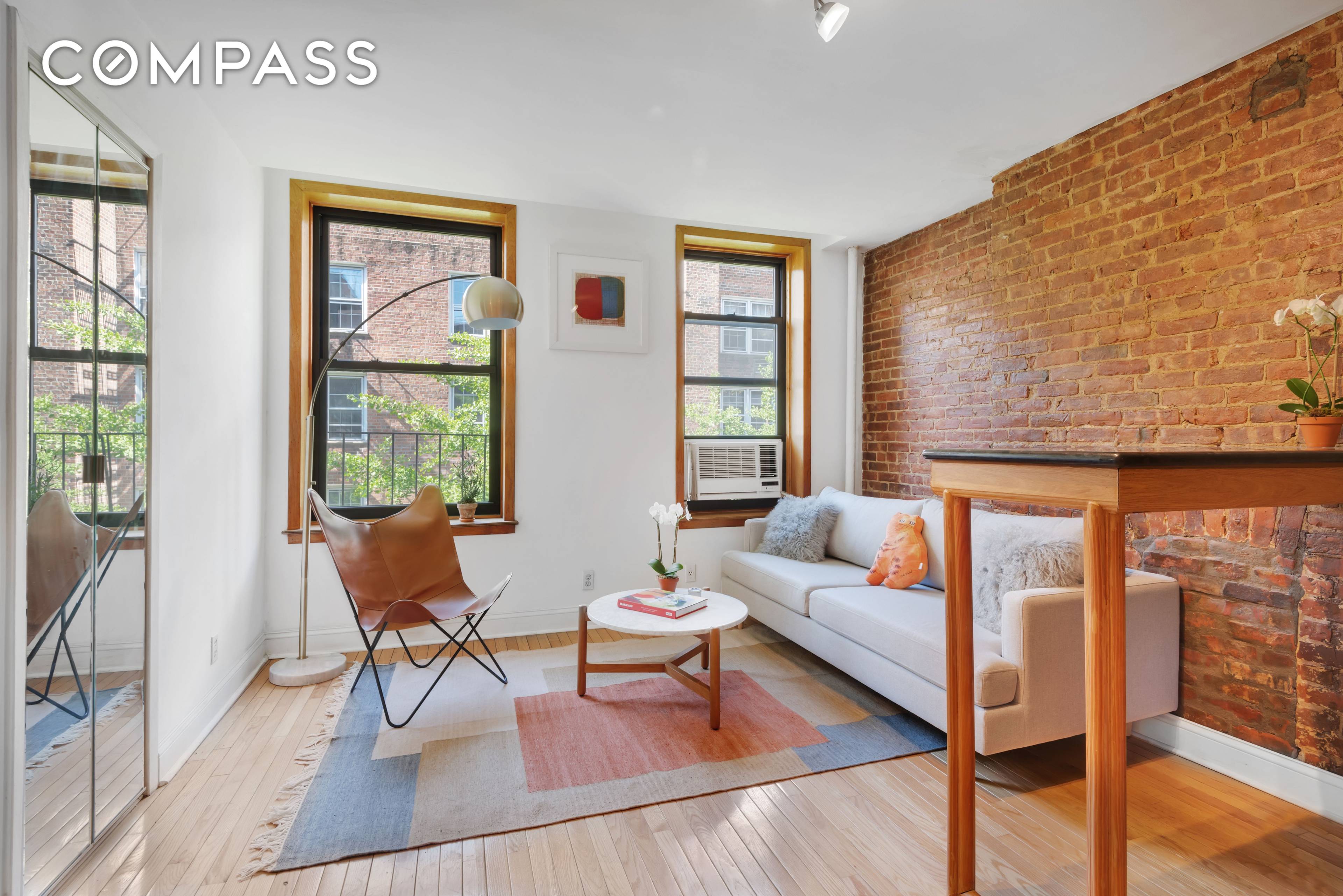 Enjoy the sun, sky, lush treetops, and birdsong from this charming jewel box on the Upper East Side.