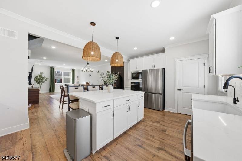 Welcome home to this like new residence in the desirable Morris Woods community, offering modern design, smart home convenience, and low maintenance living.