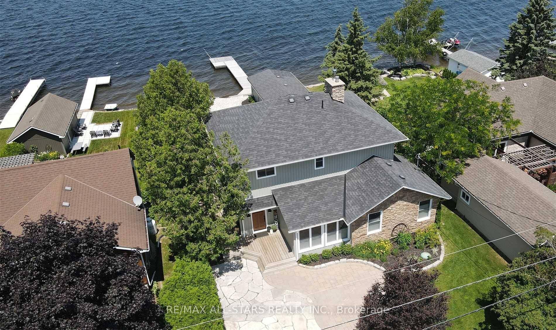 This is your chance to embrace luxury lakefront living from this stunning sun filled home which has been extensively renovated and upgraded and shows pride of ownership throughout.
