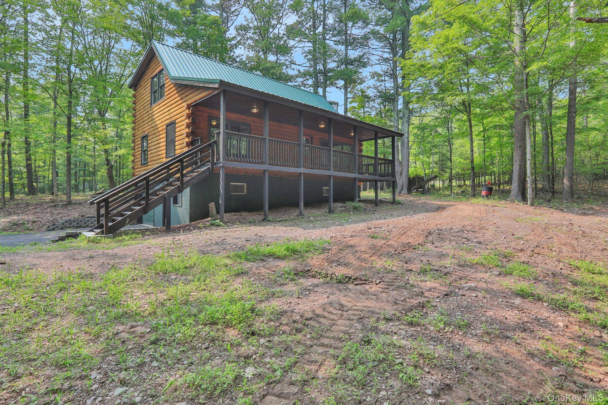 Pride of ownership shines through this log home located in the hamlet of Round Top !
