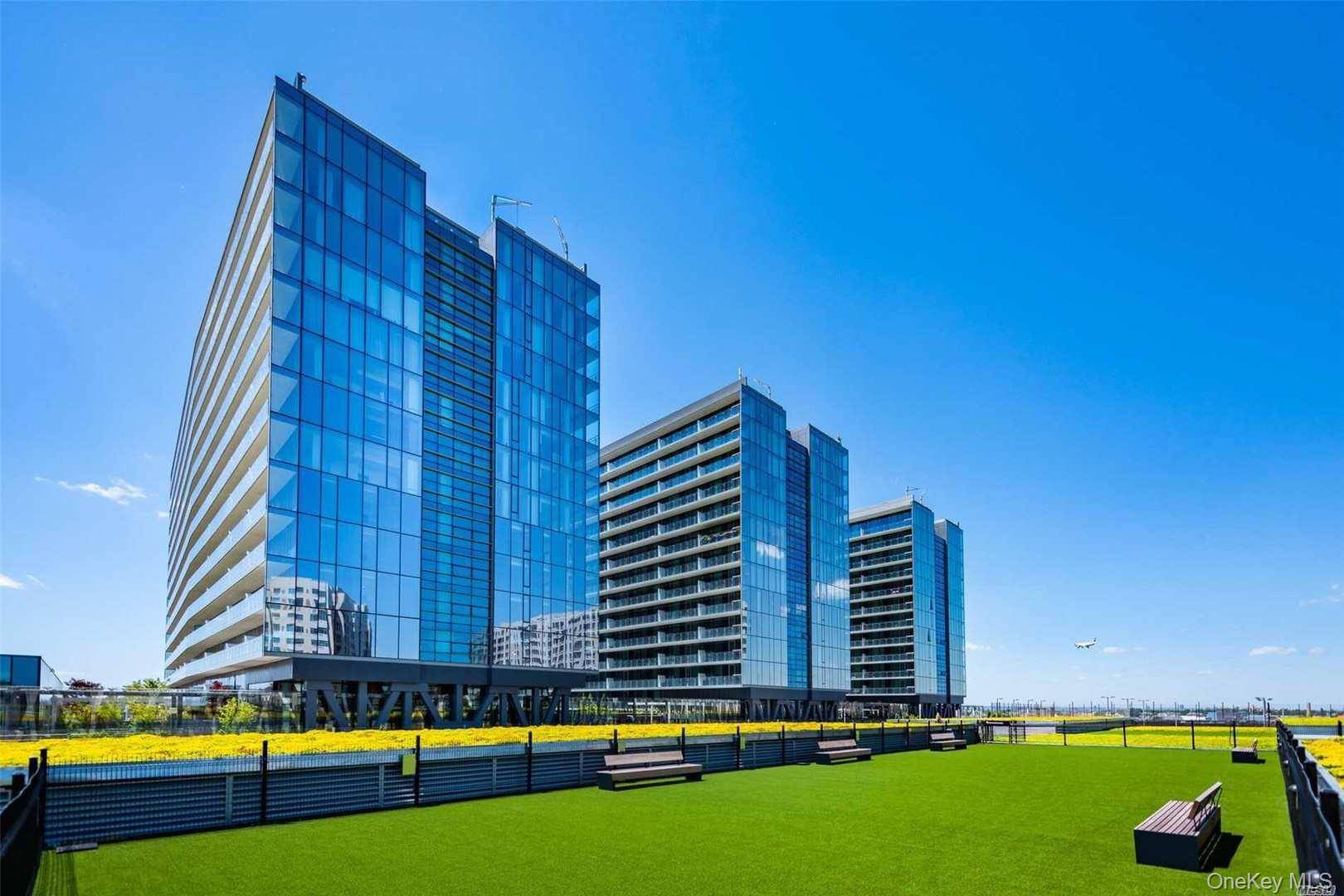 Welcome to Grand 1 at Sky View Parc a spectacular south facing two bedroom, two bathroom residence with a den.