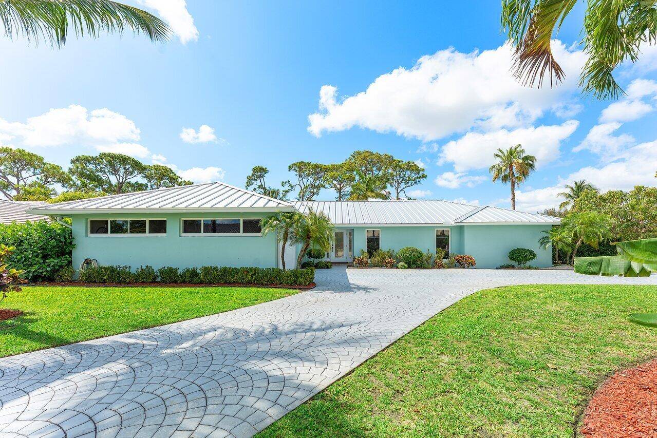 Effortless Florida Living in a Fully Renovated Key West Style Ranch Welcome to easy, elevated living in the heart of the City of Atlantis.