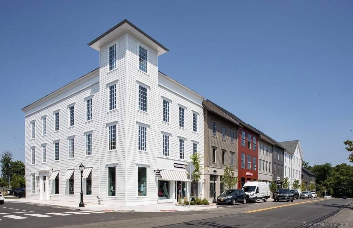 Step into this luxury unit that offers refined elegance, modern design, and privacy all in the heart of downtown Darien's premier neighborhood, The Corbin District.