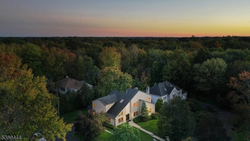 Located on an idyllic cul de sac in the highly desirable Parkwood section of Scotch Plains, this gracious home has it all !