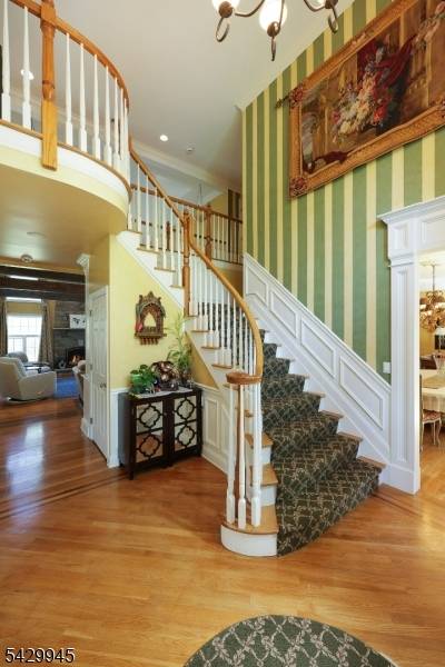 Step into exceptional luxury in this stunning Basking Ridge rental, where grand architectural details and resort style amenities create an extraordinary lifestyle.