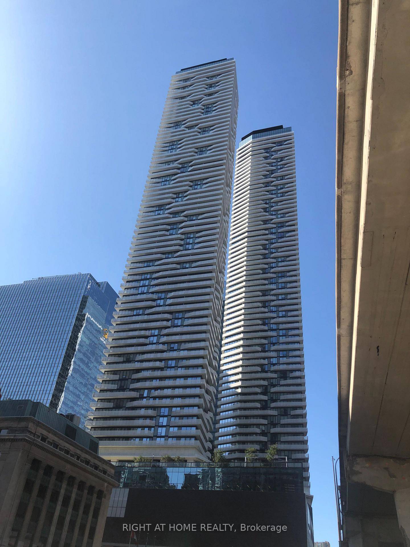 Luxurious And Spacious Corner Suite With Wrap Around Balcony, Floor To Ceiling Windows WithBreath Taking City amp ; Lake View, 2 Bed amp ; 2 Full Baths, 1 Parking Included.