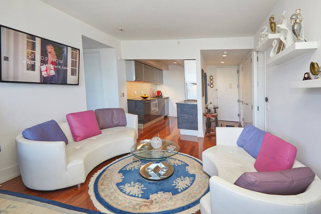 Welcome to unit 48C at 350 West 42nd Street, where elevated living meets breathtaking views in the heart of a vibrant locale.