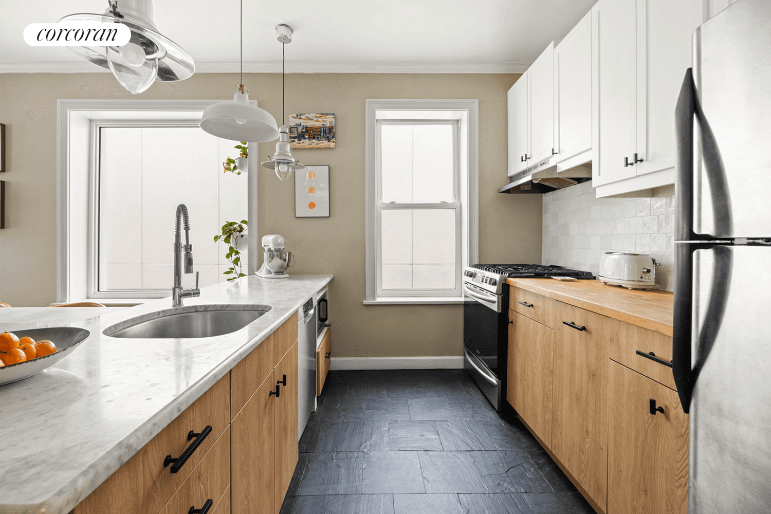 NEW PRICE ! This top floor, two bedroom condo in the heart of Park Slope offers a peaceful sanctuary.