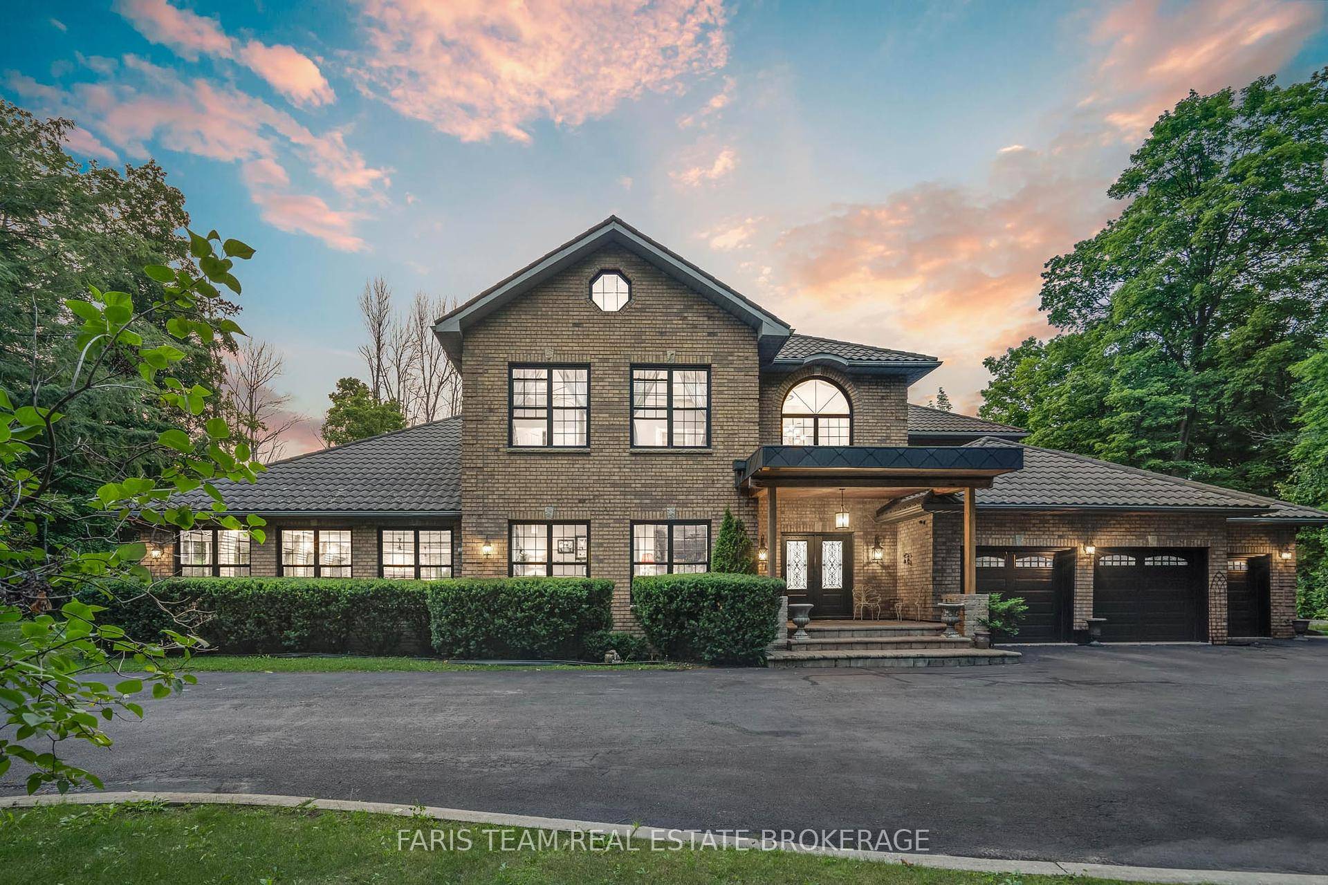 Top 5 Reasons You Will Love This Home 1 Striking custom built residence set on a sprawling 2.