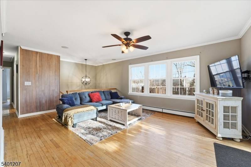 Discover a rare opportunity to own a bi level home perched high on the Ramapo Mountains in Oakland's sought after Crystal Lake community.