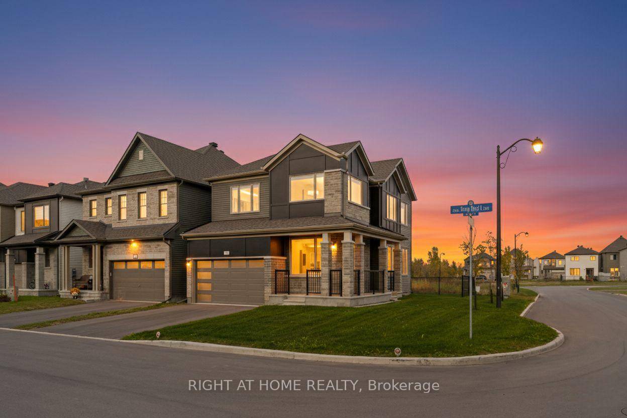 Stunning, 2024 built, 4 bedroom den, 4 bathroom home perfectly situated on a corner lot with no rear neighbours, offering exceptional privacy and modern living.