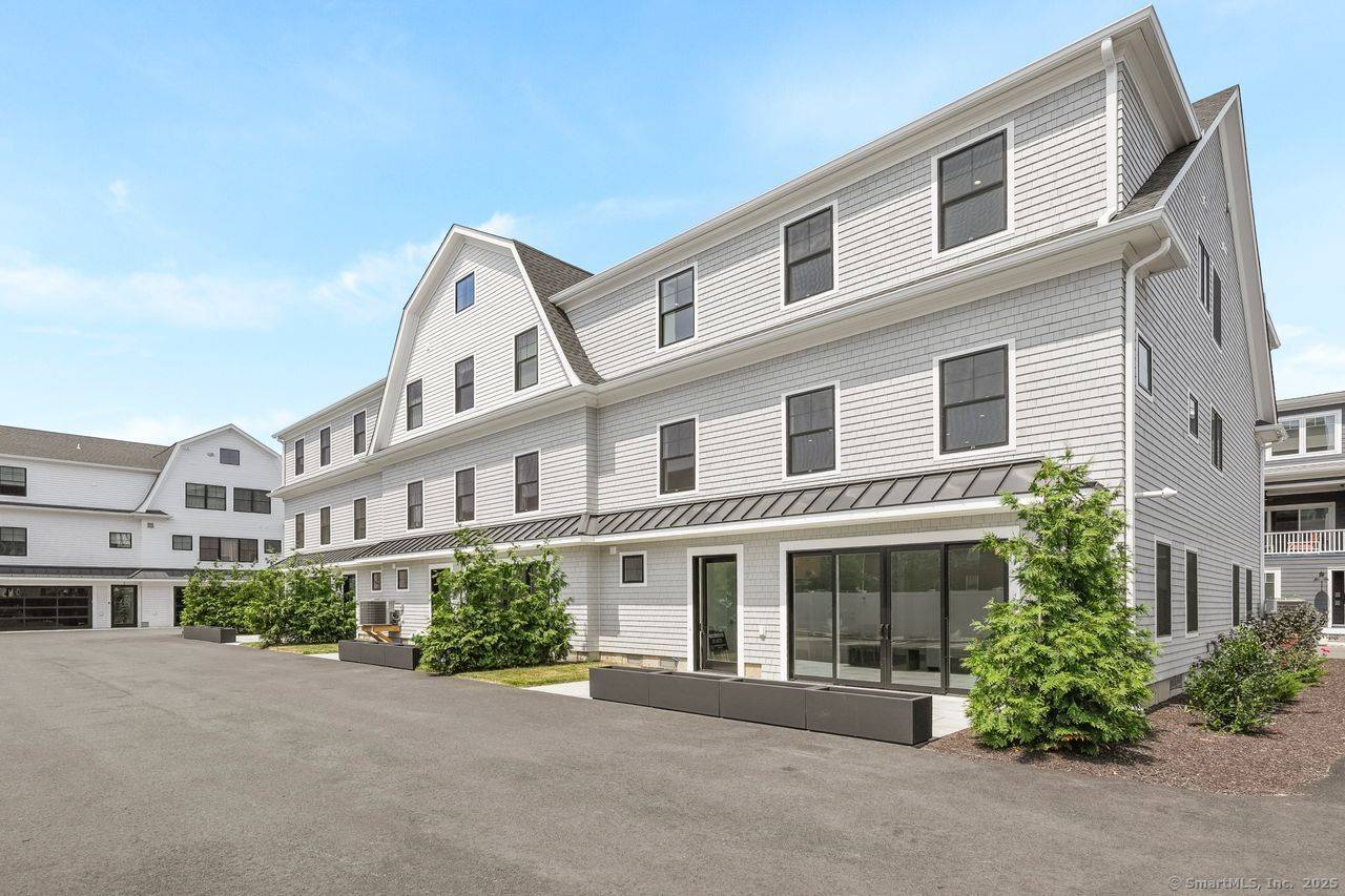 Approximately 4, 000 square feet townhouse feels like a single family home with thoughtfully designed living space and featuring four bedrooms, four en suite bathrooms, and two half baths, and ...