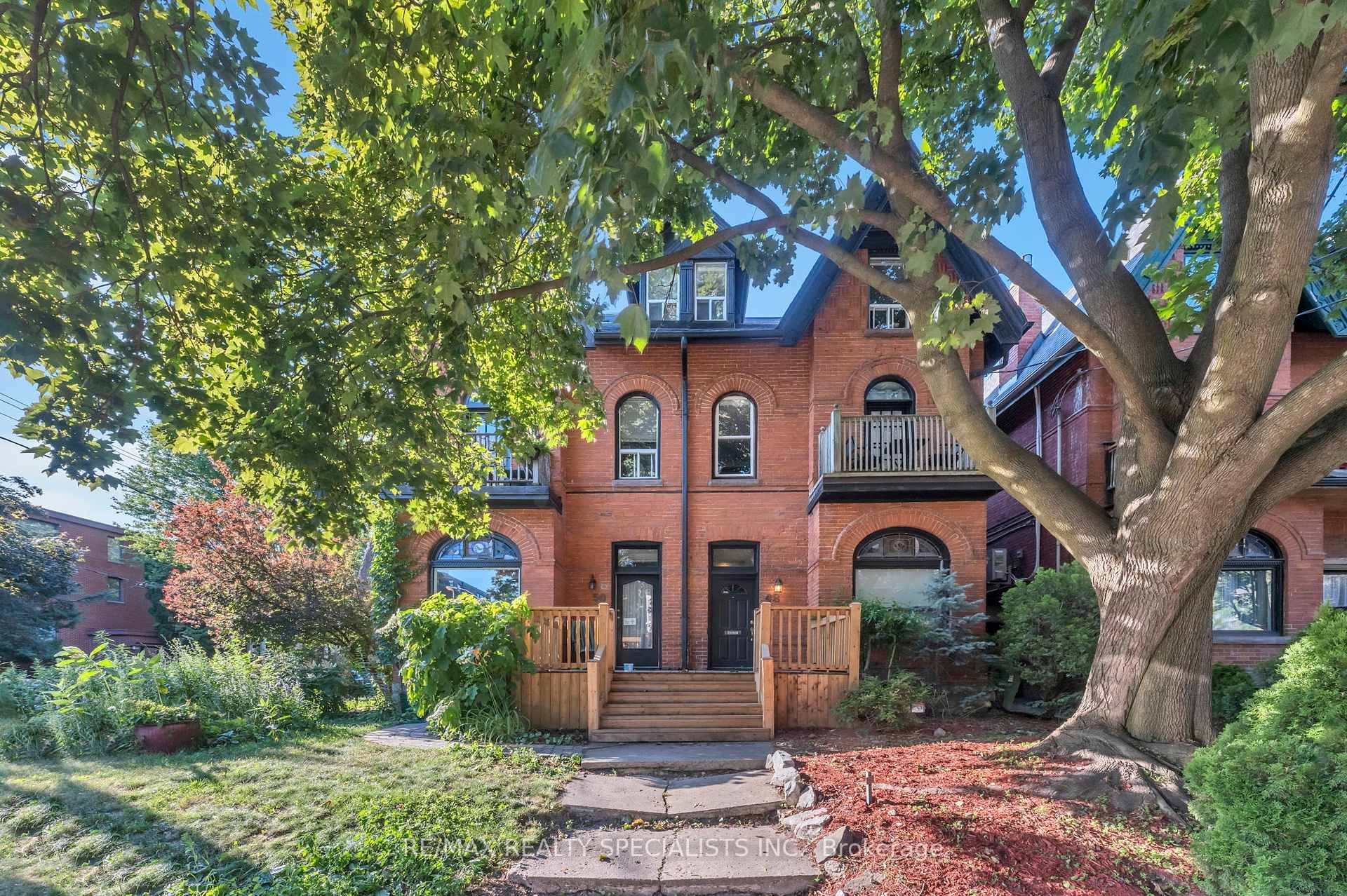 Stunning Victorian Home in Trendy Parkdale Tucked Away on a Quiet, Leafy Street.