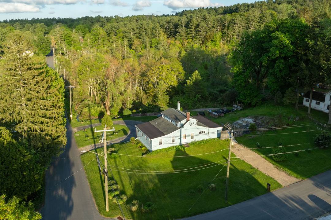 Beautifully maintained four bedroom home with two full baths located on the corner of Perry Street and Farnum Road, just a short distance to Lake Wononscopomuc and downtown Lakeville.