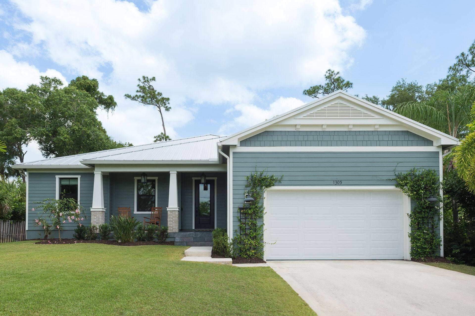 Welcome to this beautifully crafted custom built home by Showcase Designer Homes, offering quality, comfort, and functionality in the heart of Palm City.