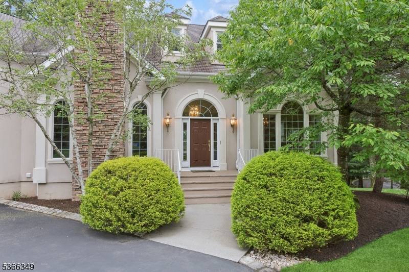 Welcome to Grand Vista, a stunning 5 bedroom, 5 bath custom home offering 100 feet of private frontage on beautiful Farrington Lake.