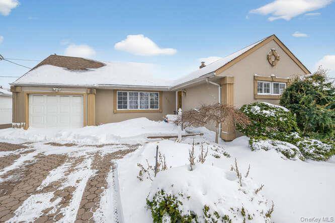 Welcome home to this 4 bedroom, 2 bathroom ranch, nestled in the heart of the desirable neighborhood of North Bellmore.