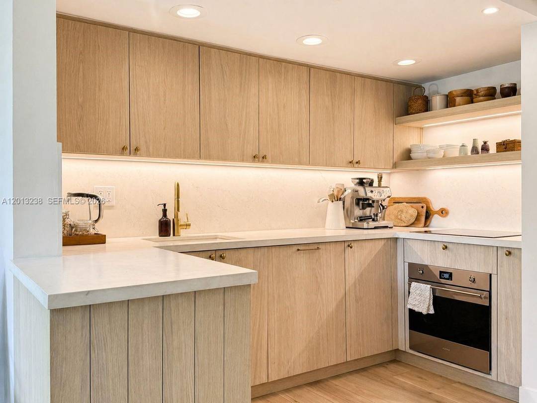Modern tri level townhome in the heart of Coconut Grove.