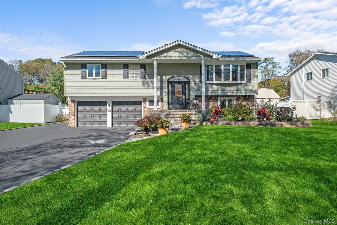 Welcome home to this beautifully maintained and tastefully updated Hi Ranch, perfectly situated in one of Commack's most sought after neighborhoods.