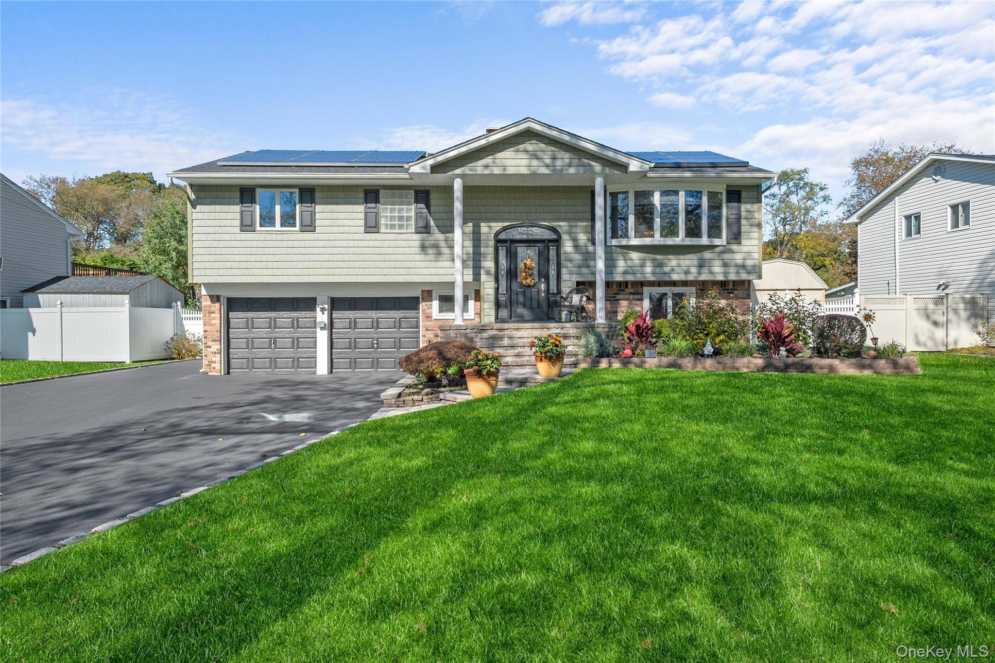 Welcome home to this beautifully maintained and tastefully updated Hi Ranch, perfectly situated in one of Commack's most sought after neighborhoods.