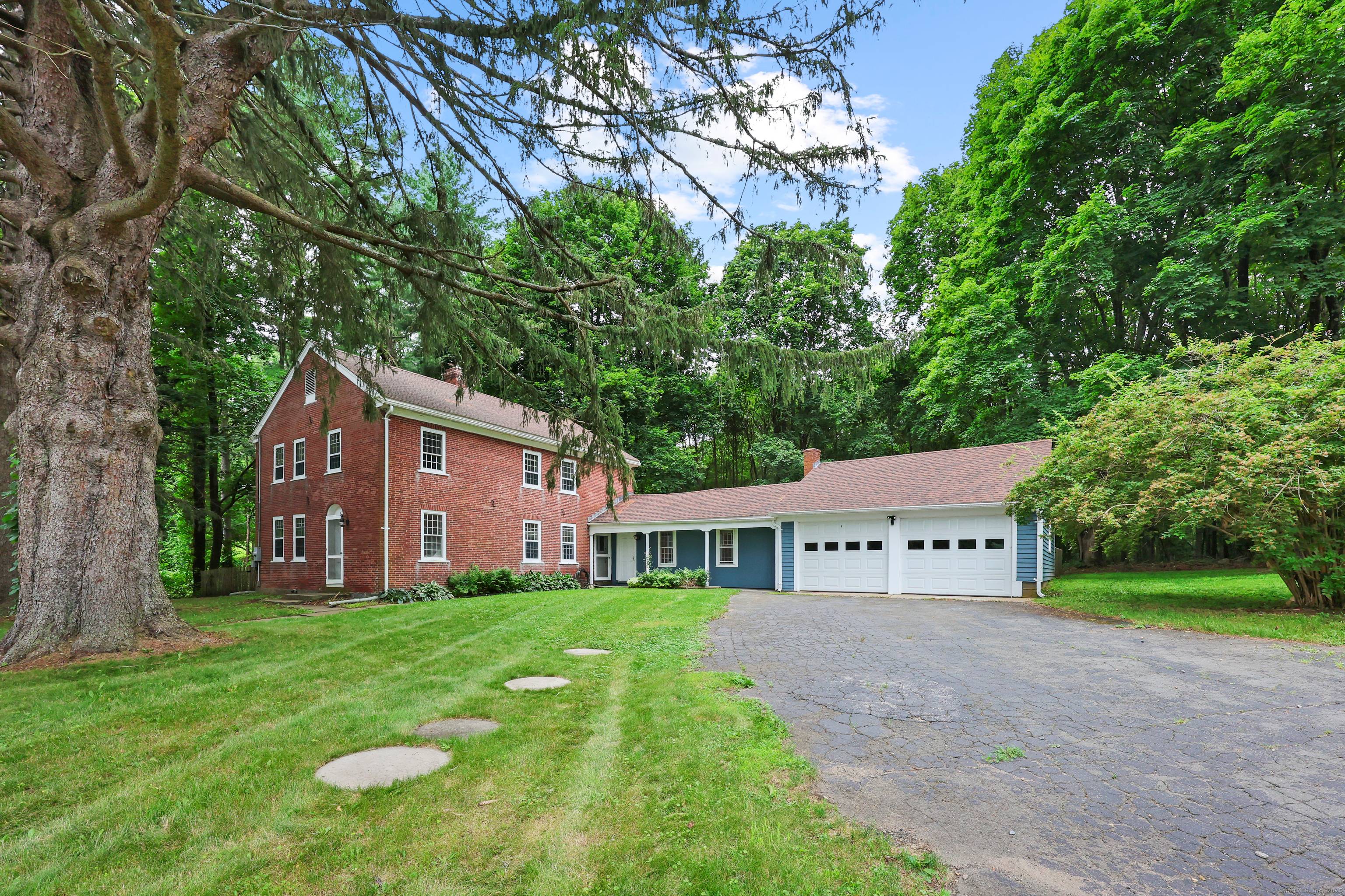 Welcome to The Captain Noah Porter Home CIRCA 1795 a classic brick federal styled home offering a blend of the charm and character of yesteryear plus numerous updated home features.