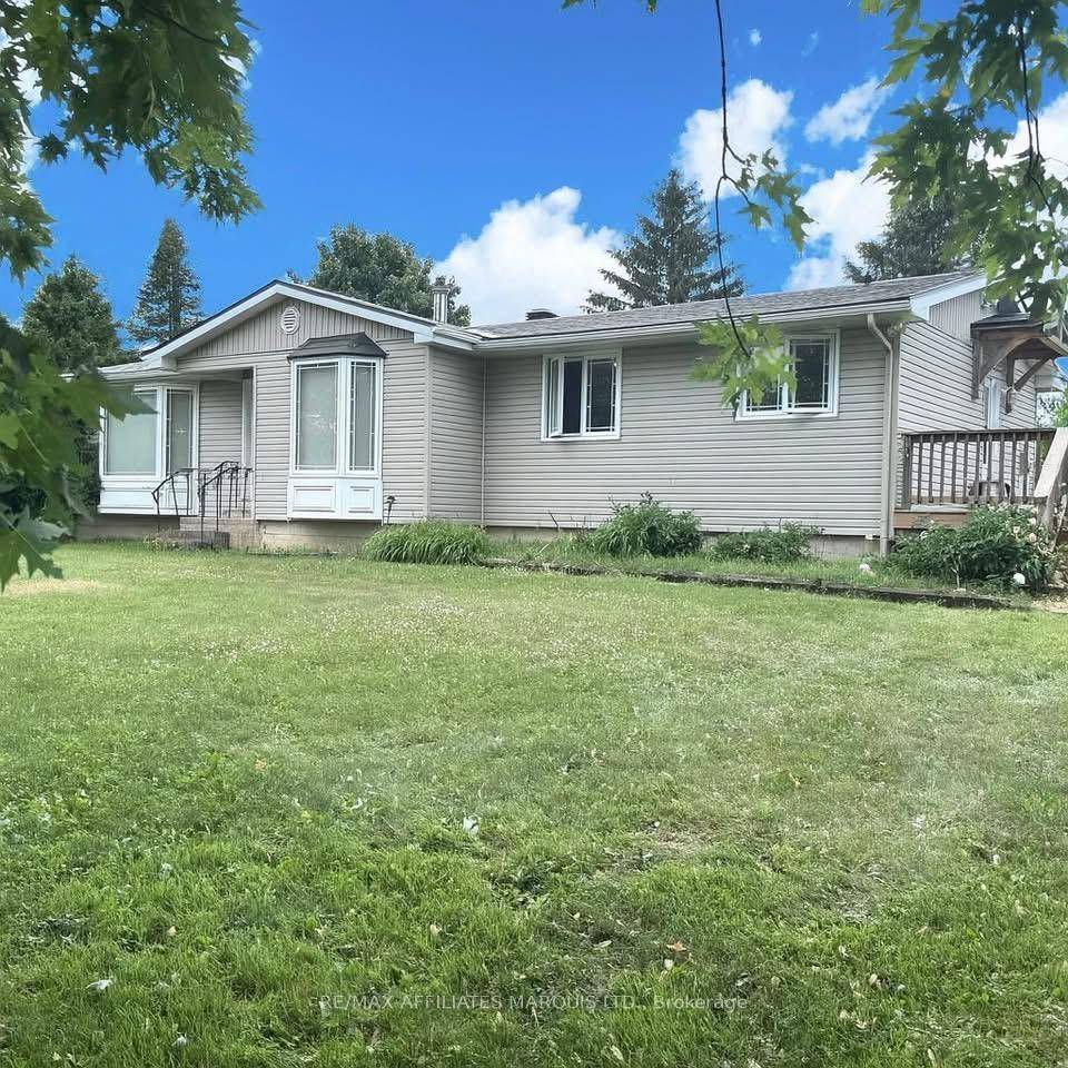 Country charm and modern efficiency meet at this lovingly maintained 2 bedroom home set on 2 acres of peaceful countryside.