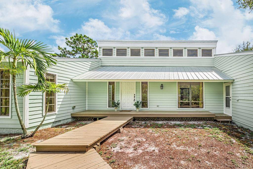PRICE IMPROVEMENT ! Unlock the potential of this COASTAL RETREAT in desirable ROCKY POINT community.