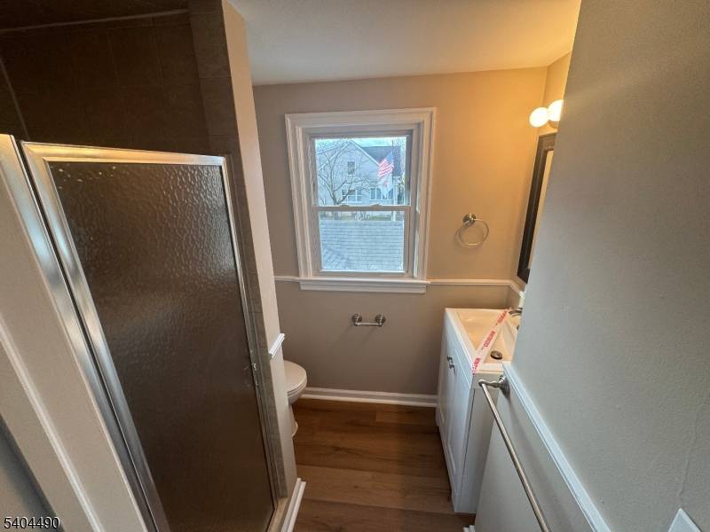 Welcome to 11 Van Dam Ave, a classic Cape Cod home set on a desirable corner lot in the heart of Bloomingdale.