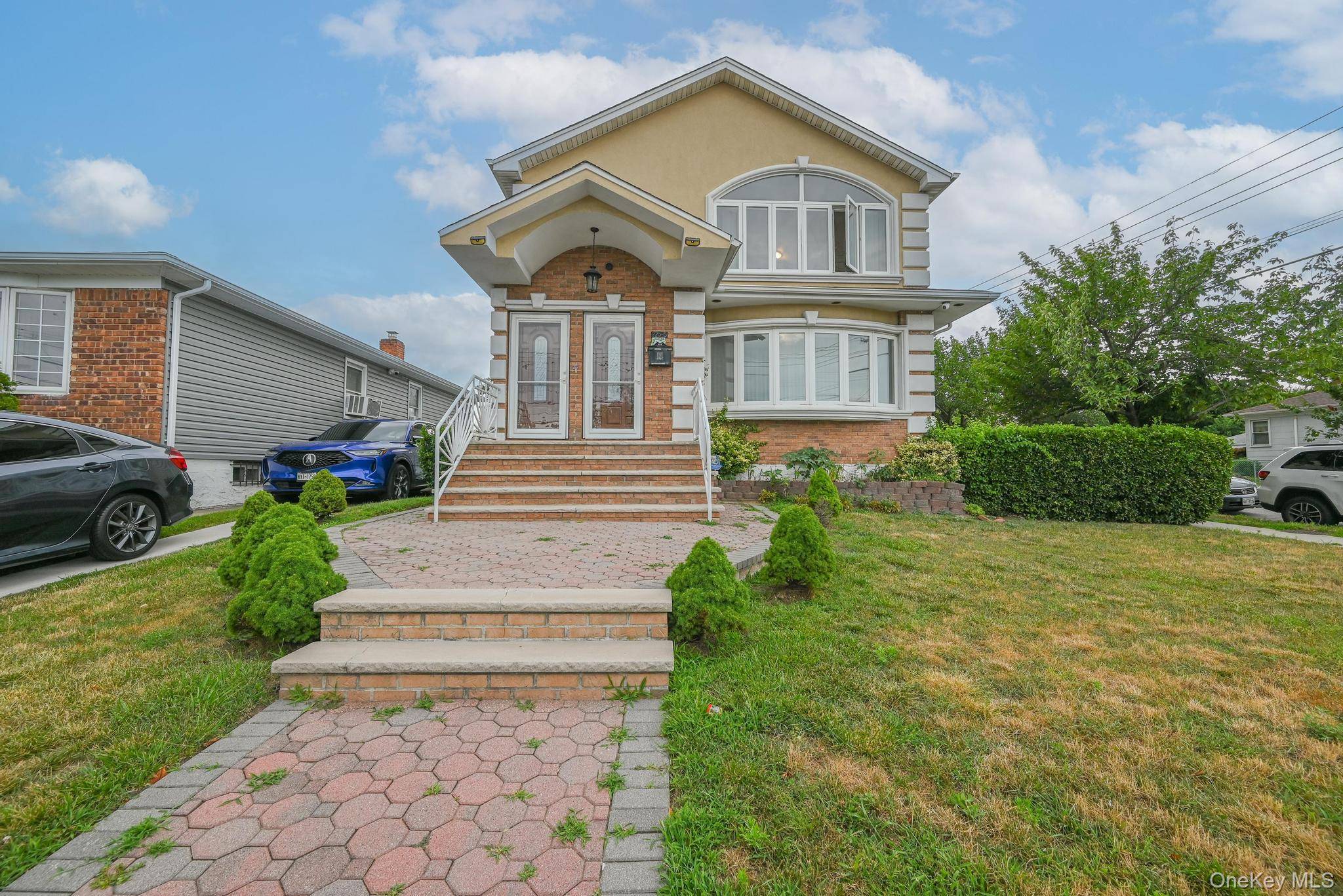 Beautifully maintained brick stucco front two family corner property in one of Queens' most desirable neighborhoods sitting on a 45x105 lot with very spacious yard including car ports and a ...