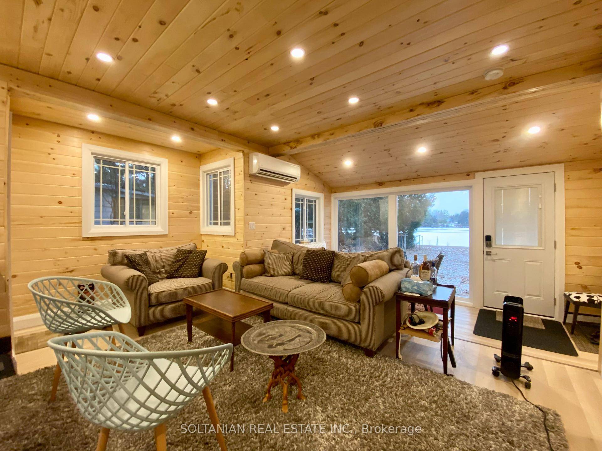 Stunning, fully rebuilt 4 season cottage on beautiful Lake just one hour from Highway 401 !