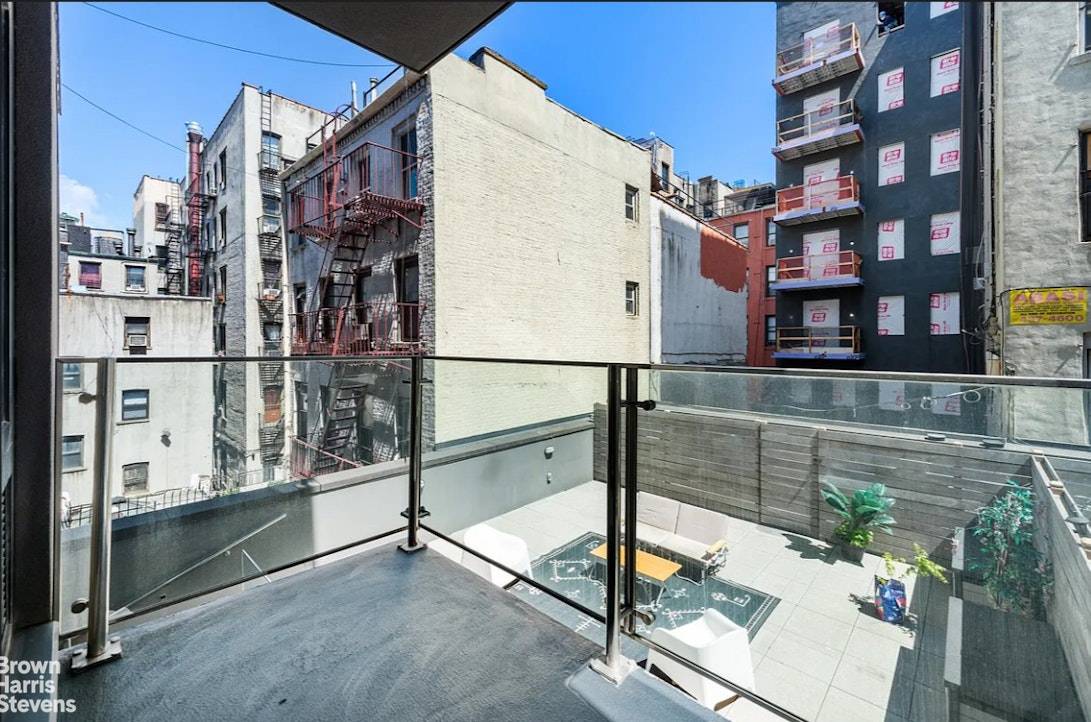 Introducing 114 Mulberry Street, nestled in the heart of Little Italy featuring a private outdoor balcony.