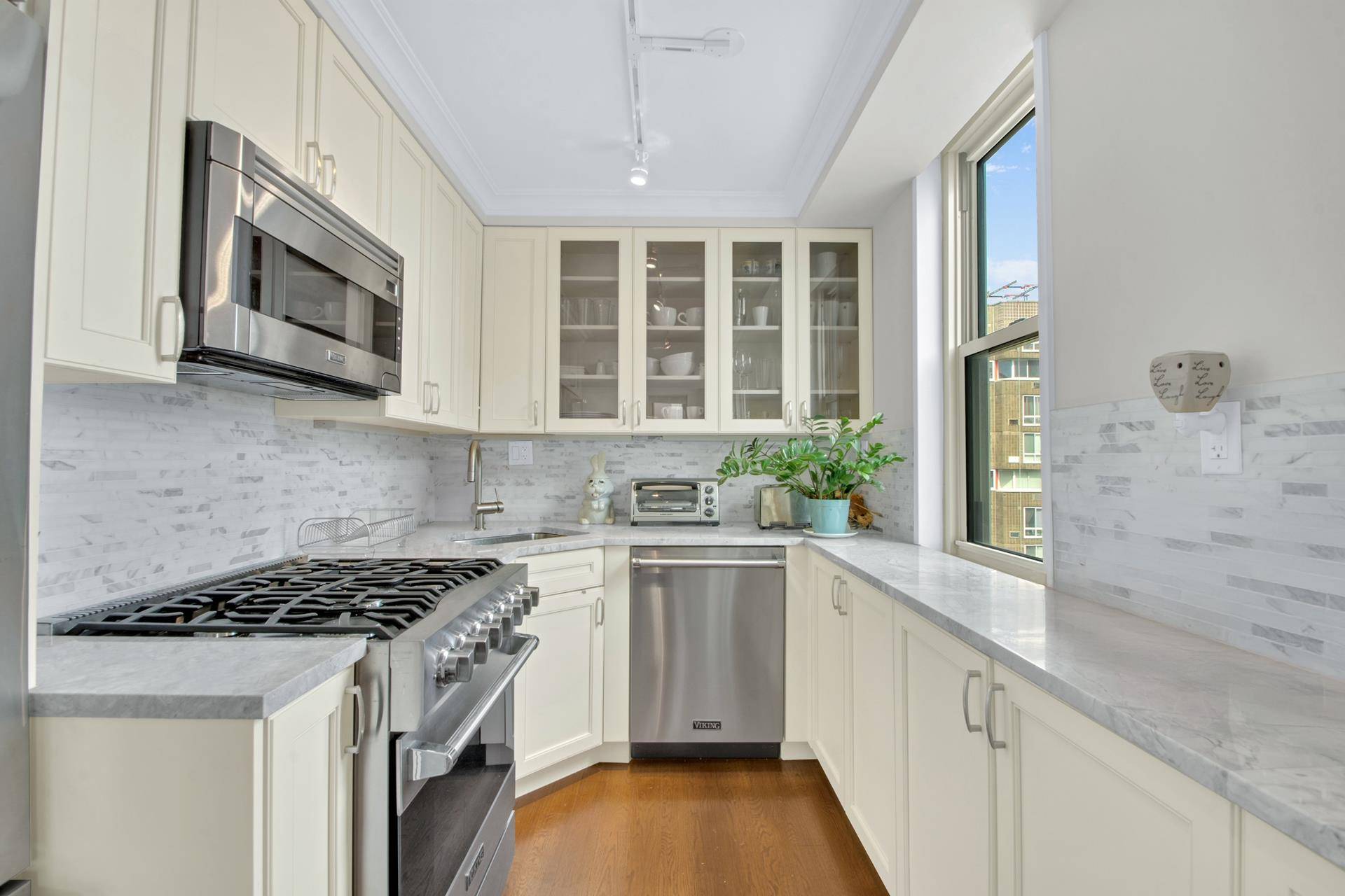 Welcome home to this spacious, sun filled, modern studio apartment !