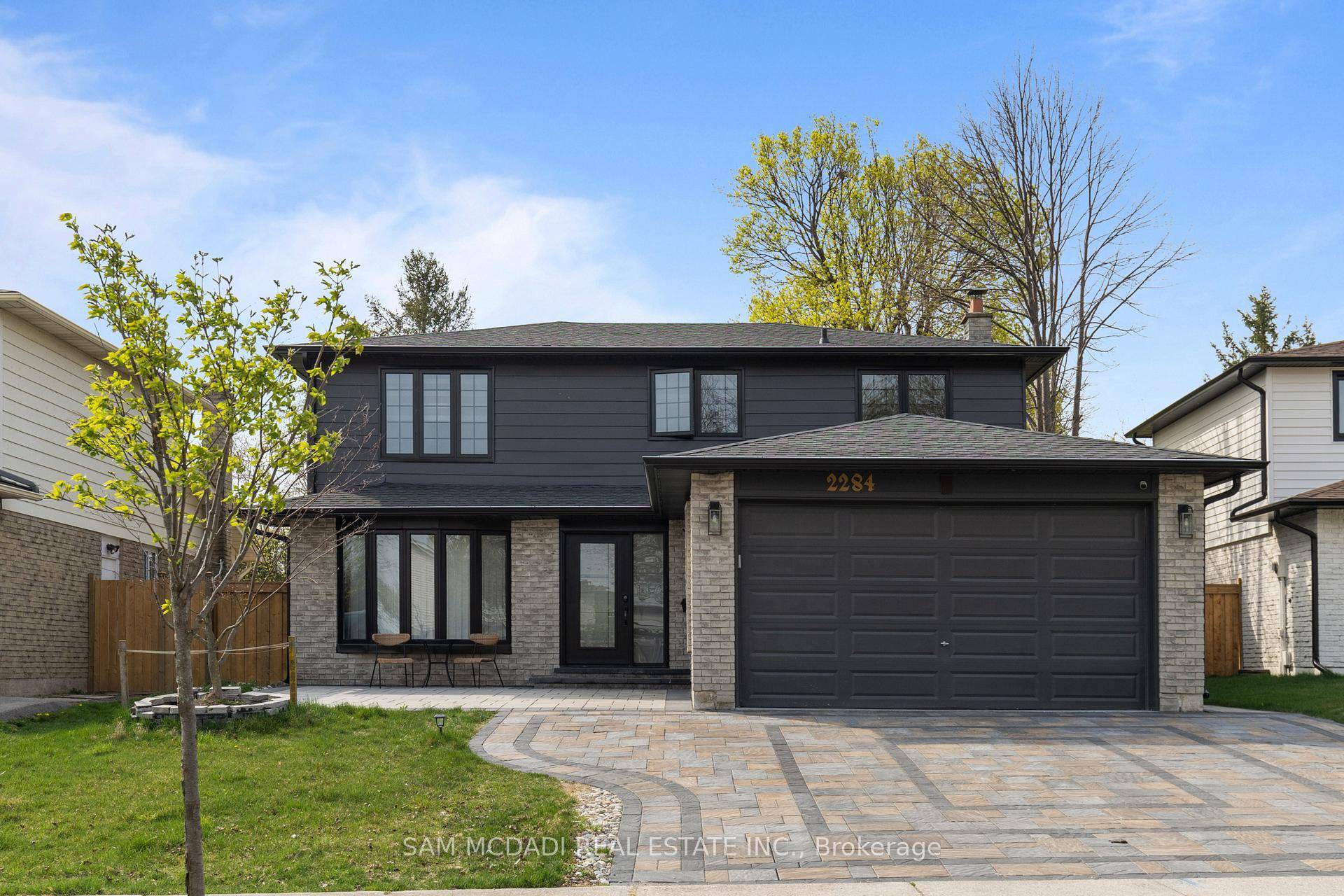 Welcome to 2284 Glastonbury Rd, a fully reimagined home designed for modern multi family living, nestled in the heart of Brant Hills.