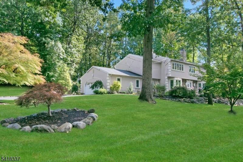 In Woodcliff Lake's prestigious West Hill neighborhood, this EXQUISITE 5 BEDROOM LUXURY HOME is now being showcased, displaying ELEGANT DESIGN, a gracious floorplan and BREATHTAKING POOL SETTING.