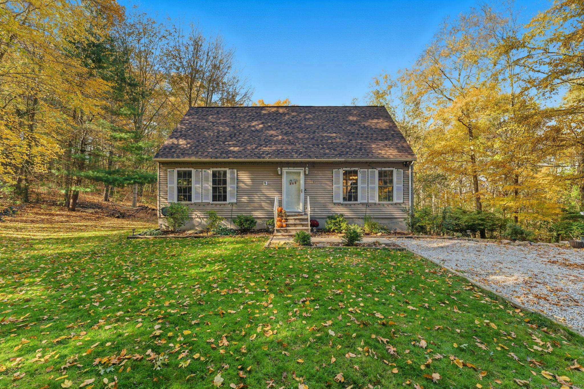 Not your average cape ! Nestled on a picturesque rear lot and set back from the road for ultimate privacy, this warm and inviting Cape Cod home offers the perfect ...