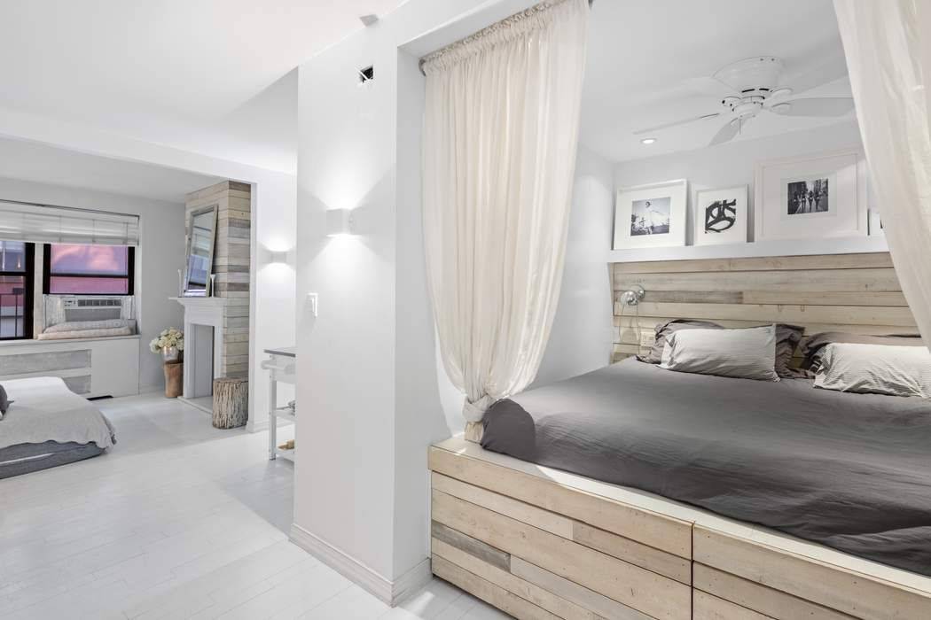 Glamorous extra large studio adorned with beautiful details, flooded with sunlight, perfectly renovated, and offered completely furnished.